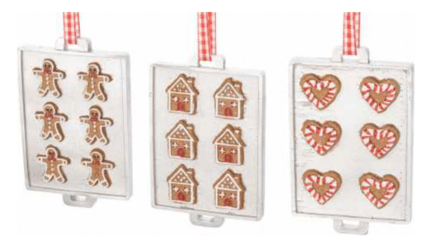 3 white trays with gingerbread cookies