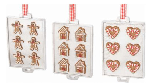 3 white trays with gingerbread cookies